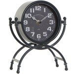 Horloge sur pieds rtro en mtal noir 21 cm